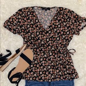 A floral blouse